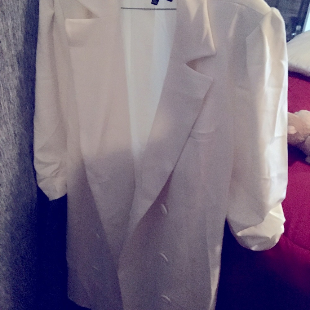 Knee length trench suit coat.